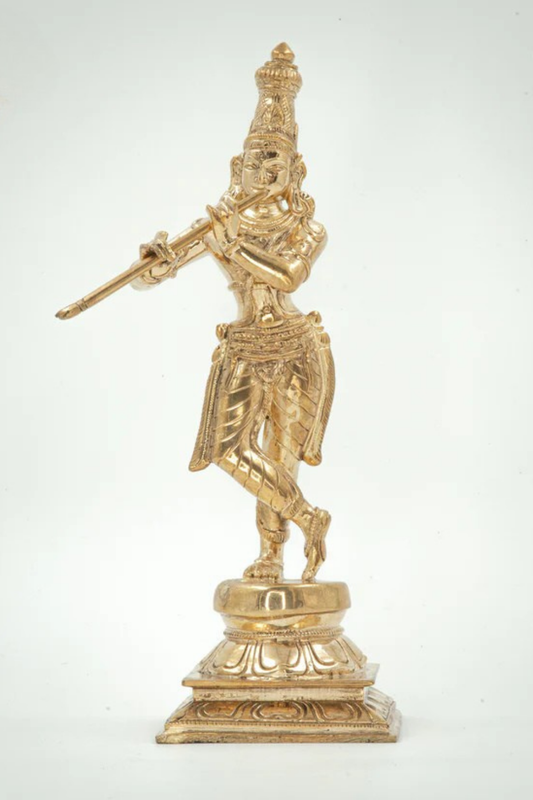 Murli Krishna (The eternal player of the flute, enchanting the world)